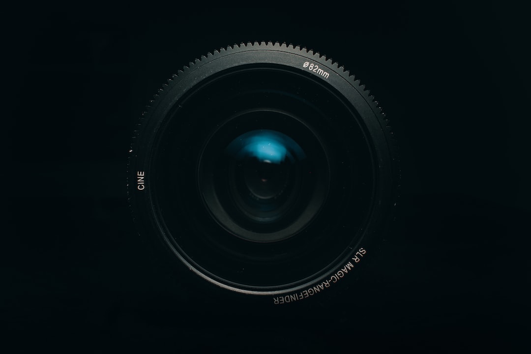 black camera lens on white background