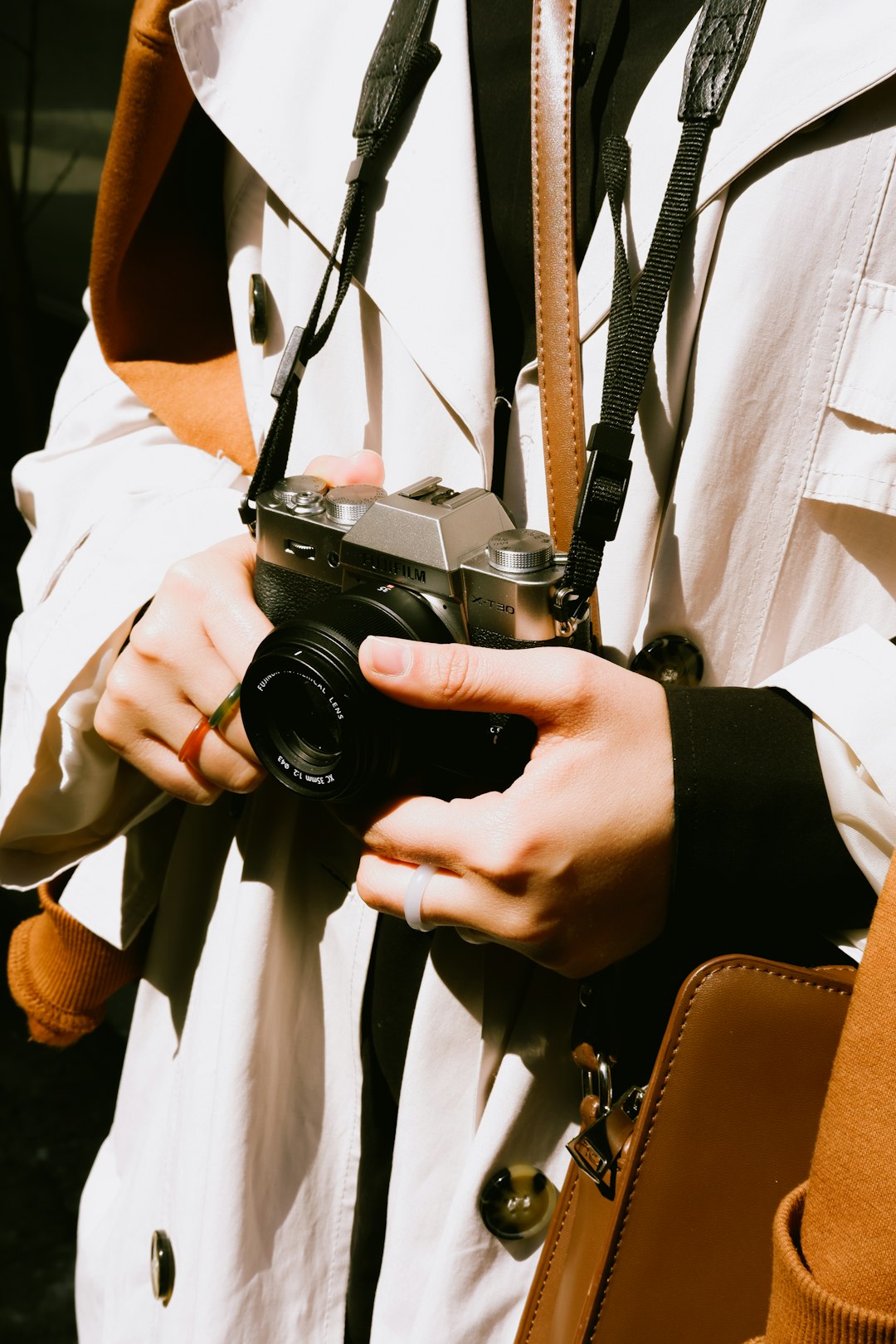 a person holding a camera in their hands