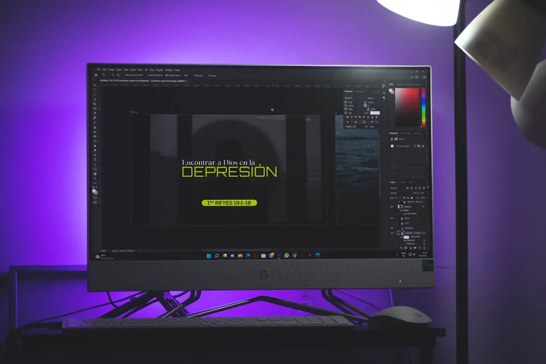 a computer monitor sitting on top of a desk